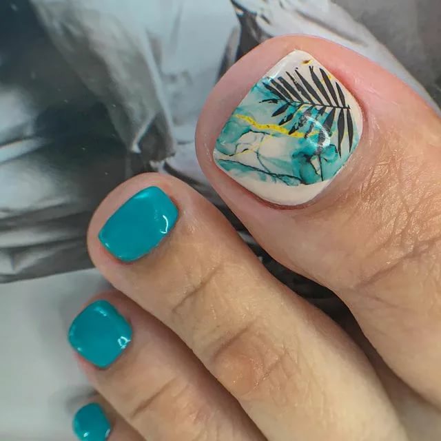 Turquoise pedicure with stamping
